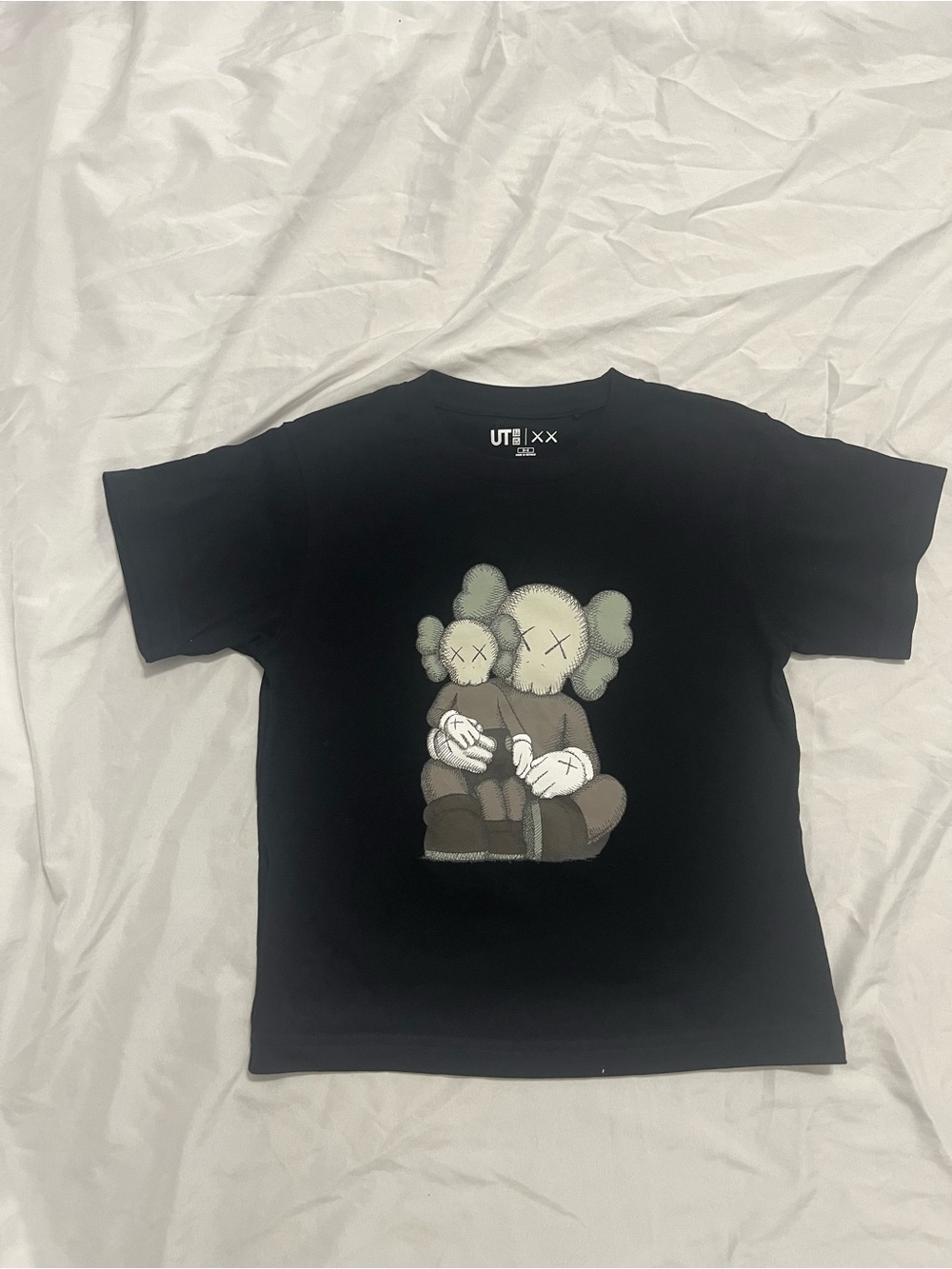 Uniqlo Black Kids Graphic Tee with KAWS-inspired Character